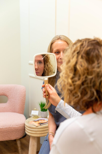 Professional skin consultation in Franklin, TN discussing PRF (Platelet-Rich Fibrin) microneedling treatment benefits